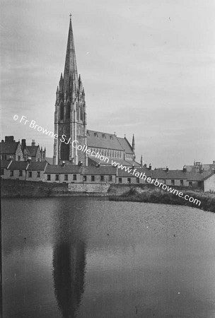 VIEW OF COAST, ST EUGENE'S CATHEDRAL REFLECTED IN WATER